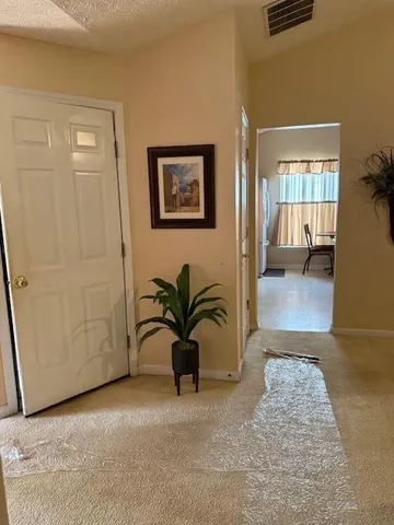 a view of livingroom with furniture and window