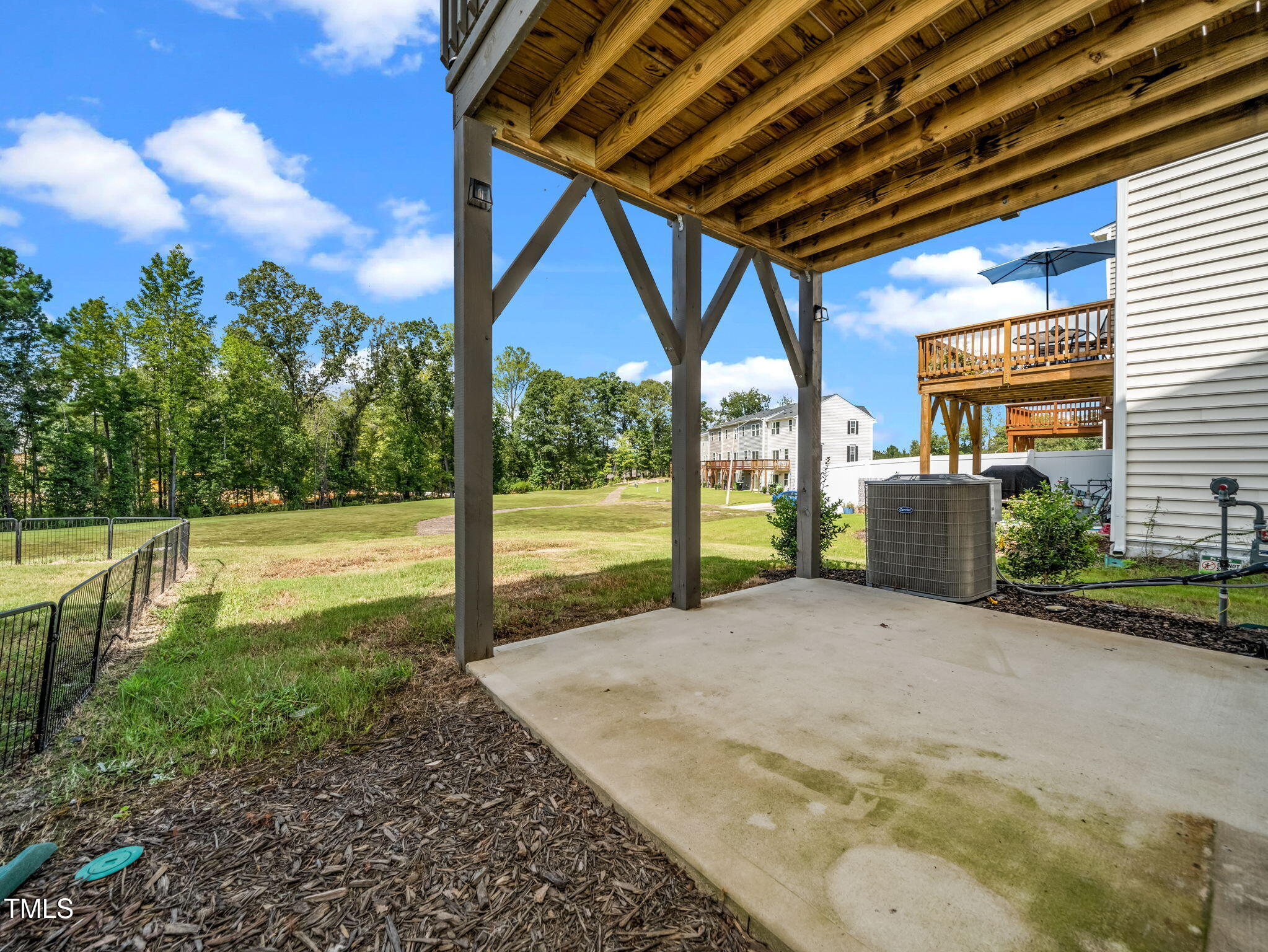 6429 Pathfinder Way Raleigh, NC 27616 - Photo 18 of 18 a view of a backyard of the house