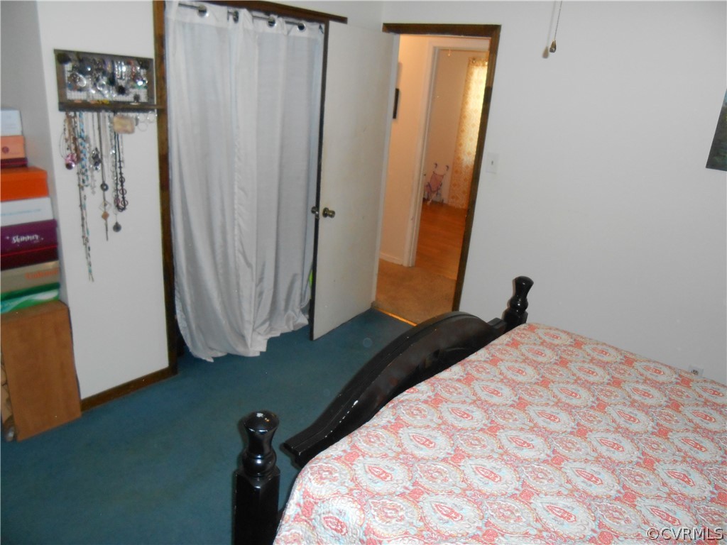 3132 Fielding Road Chester, VA 23831 - Photo 25 of 28 a bedroom with a bed and a window