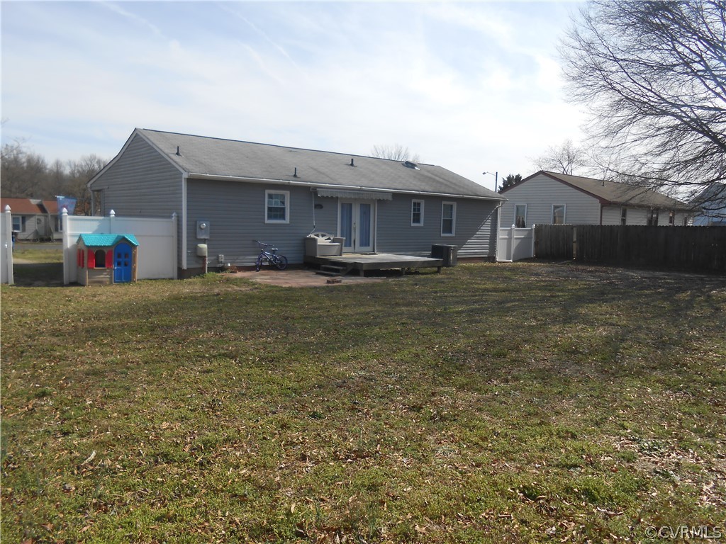 3132 Fielding Road Chester, VA 23831 - Photo 6 of 28 a view of a house with a patio and a yard