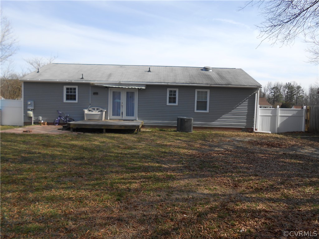 3132 Fielding Road Chester, VA 23831 - Photo 7 of 28 a front view of a house with a yard