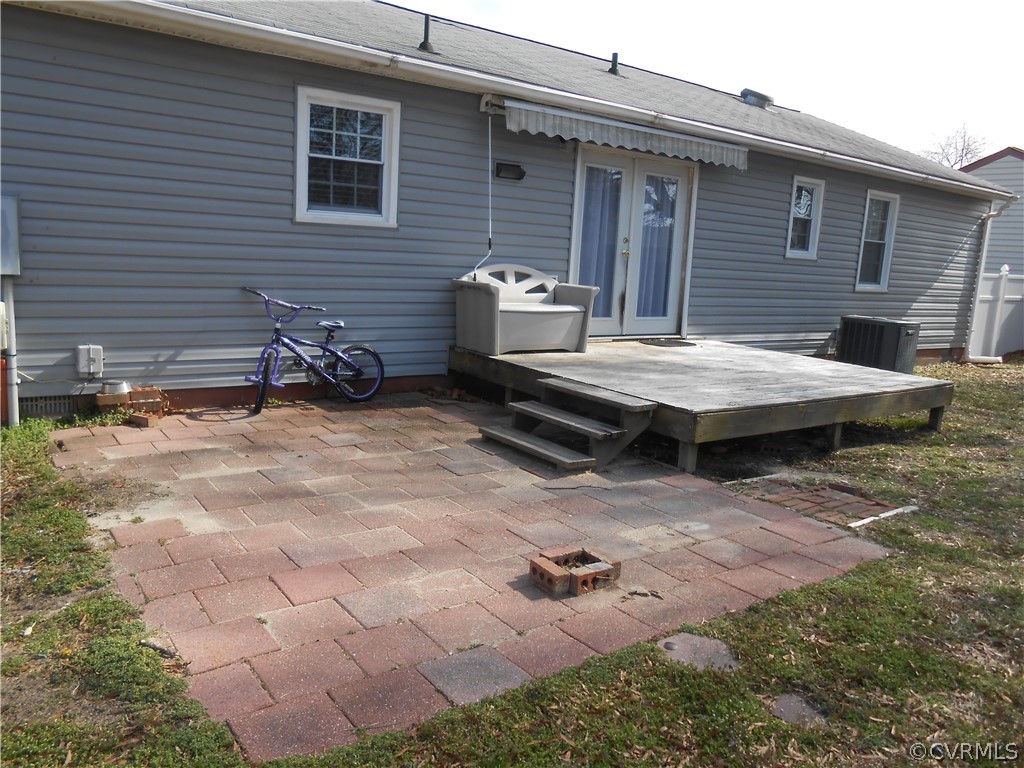 3132 Fielding Road Chester, VA 23831 - Photo 8 of 28 a backyard of a house with table and chairs