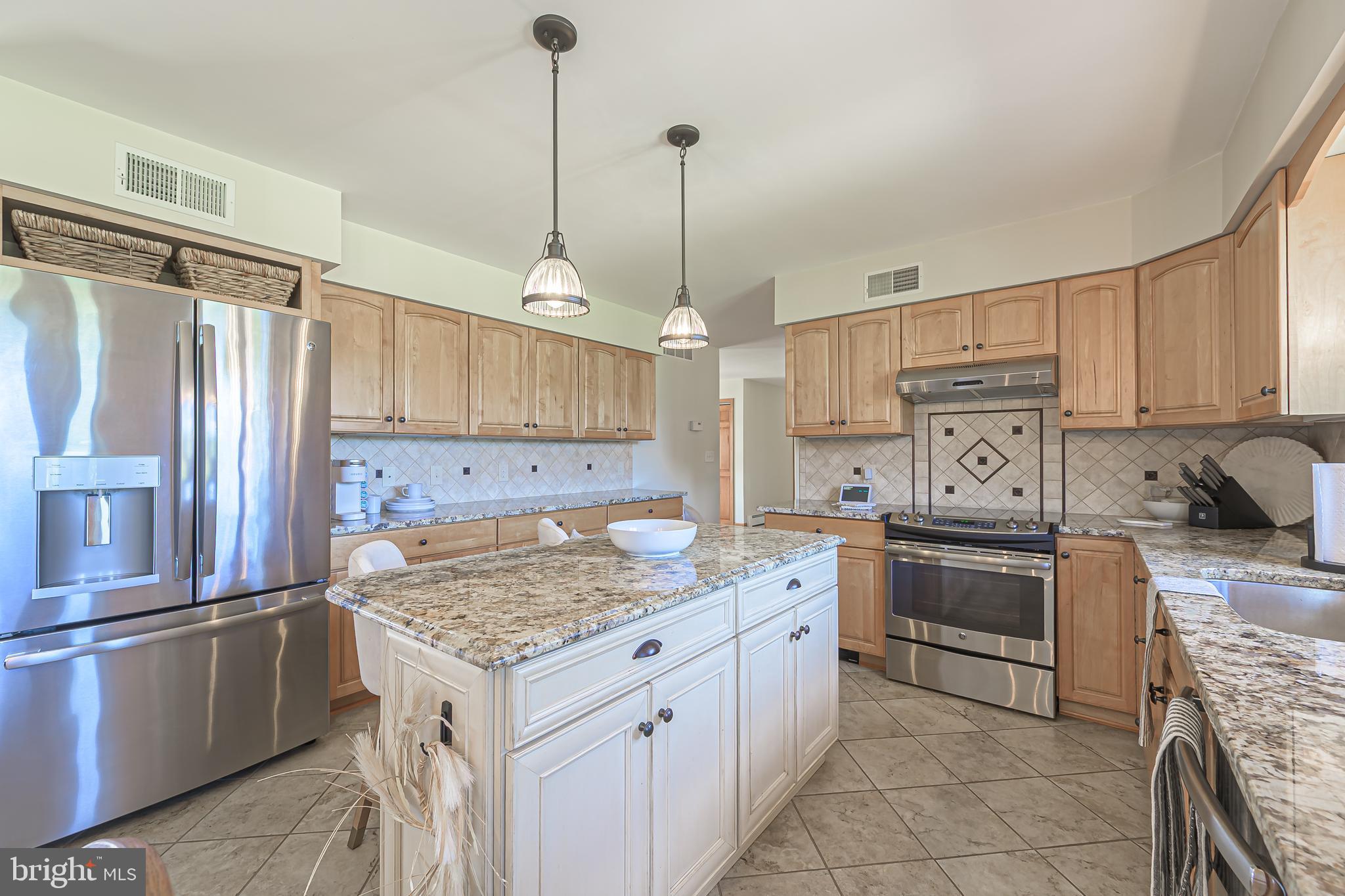 4926 Landis Avenue Vineland, NJ 08360 - Photo 17 of 73 a kitchen with a sink stove and refrigerator