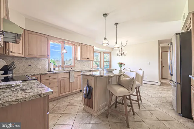 a view of a dining room with furniture window and chandelier