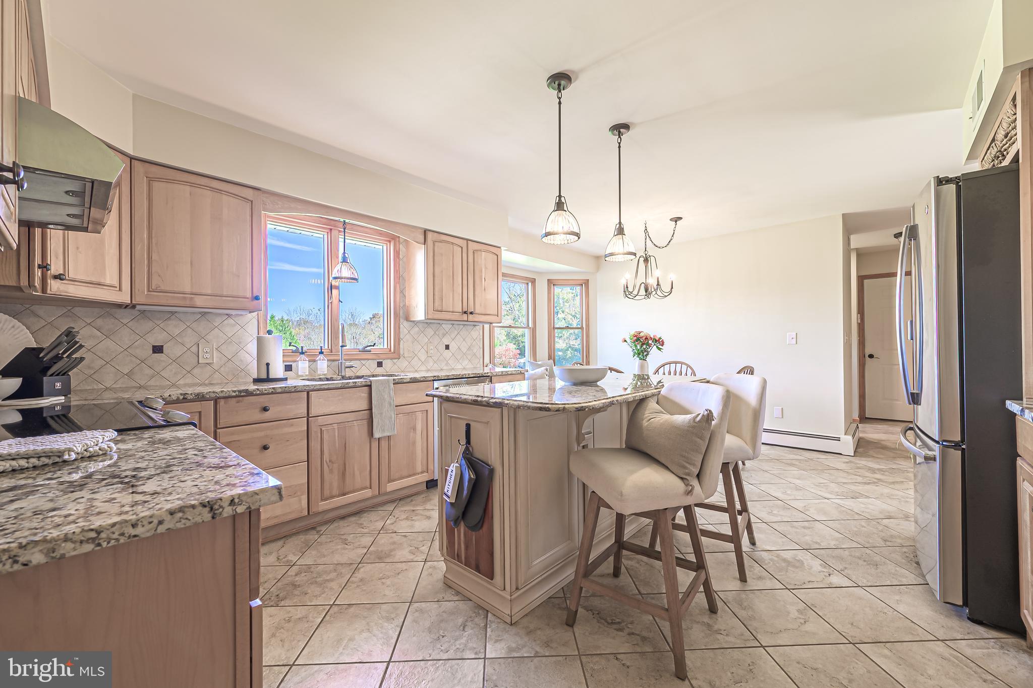 4926 Landis Avenue Vineland, NJ 08360 - Photo 21 of 73 a kitchen with a sink a counter top space appliances and cabinets
