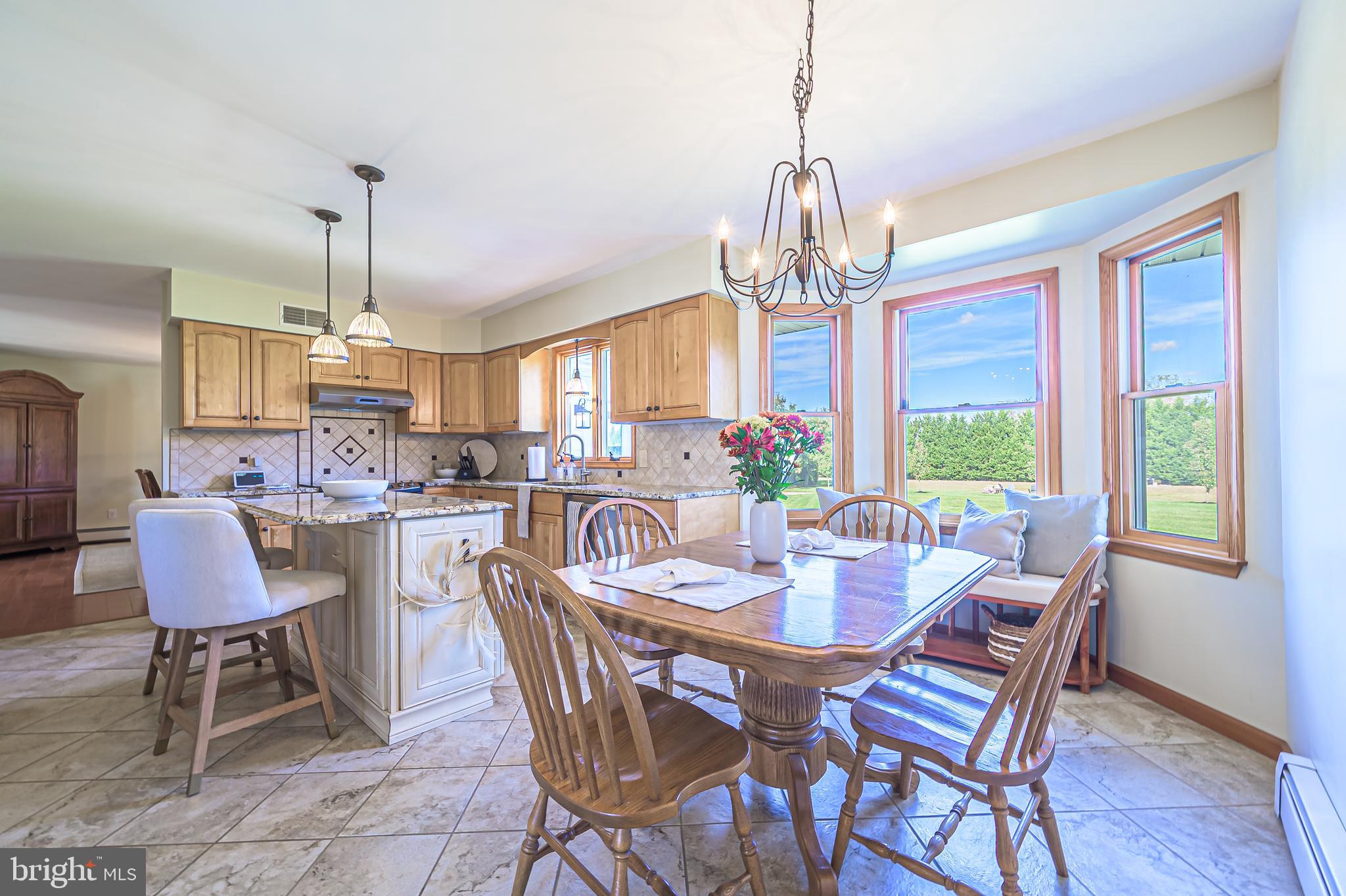 4926 Landis Avenue Vineland, NJ 08360 - Photo 22 of 73 a dining room with furniture a chandelier and window