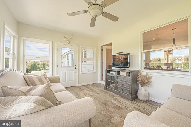a view of empty room with wooden ceiling