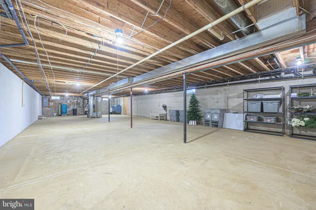an aerial view of a residential houses with outdoor space