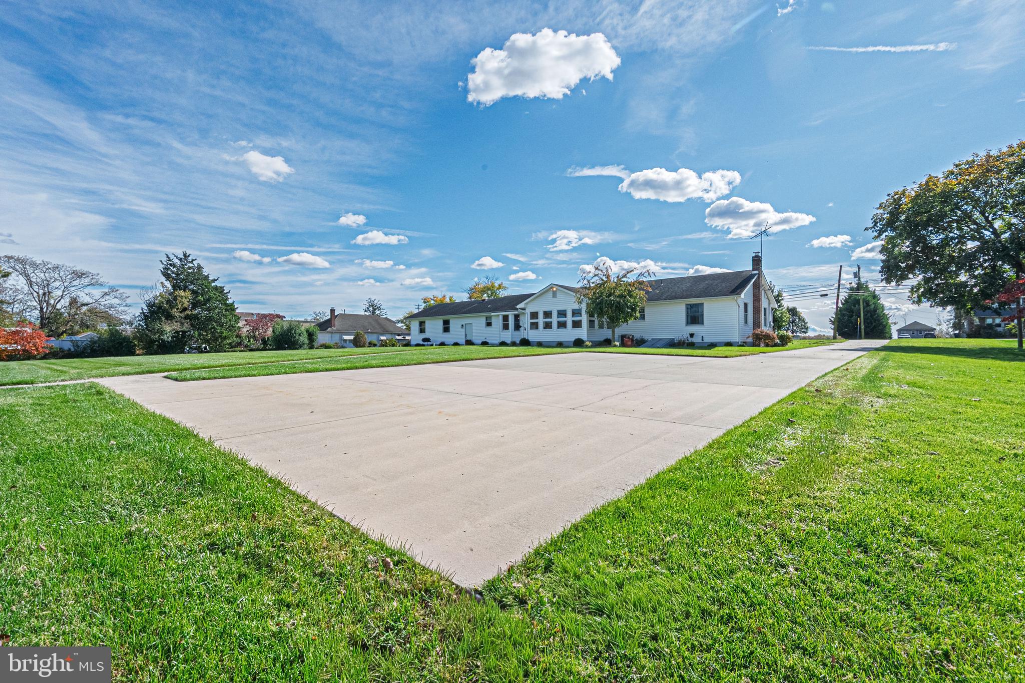 4926 Landis Avenue Vineland, NJ 08360 - Photo 52 of 73 a view of a building with a big yard