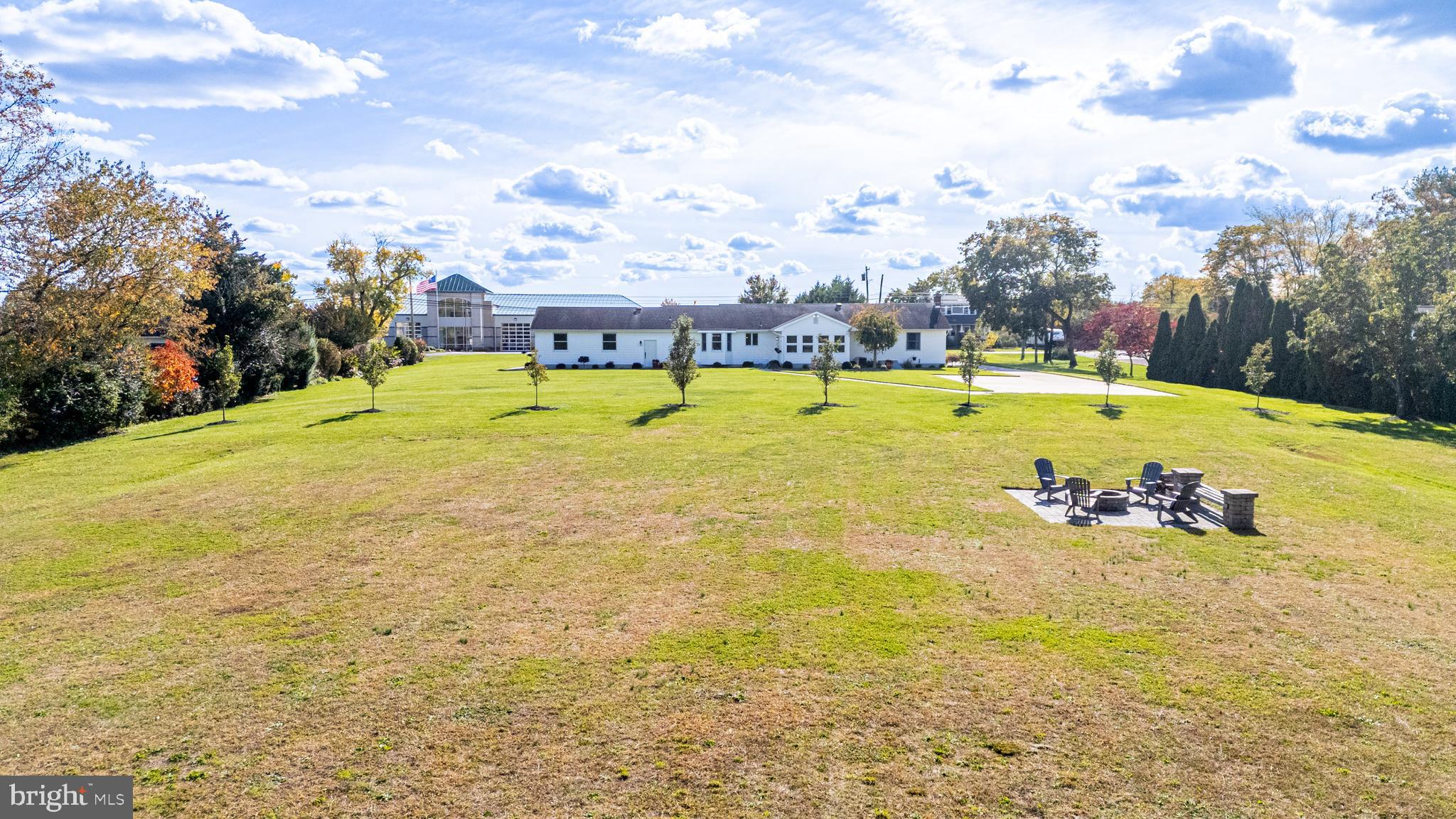 4926 Landis Avenue Vineland, NJ 08360 - Photo 56 of 73 a view of a swimming pool with an outdoor seating and yard