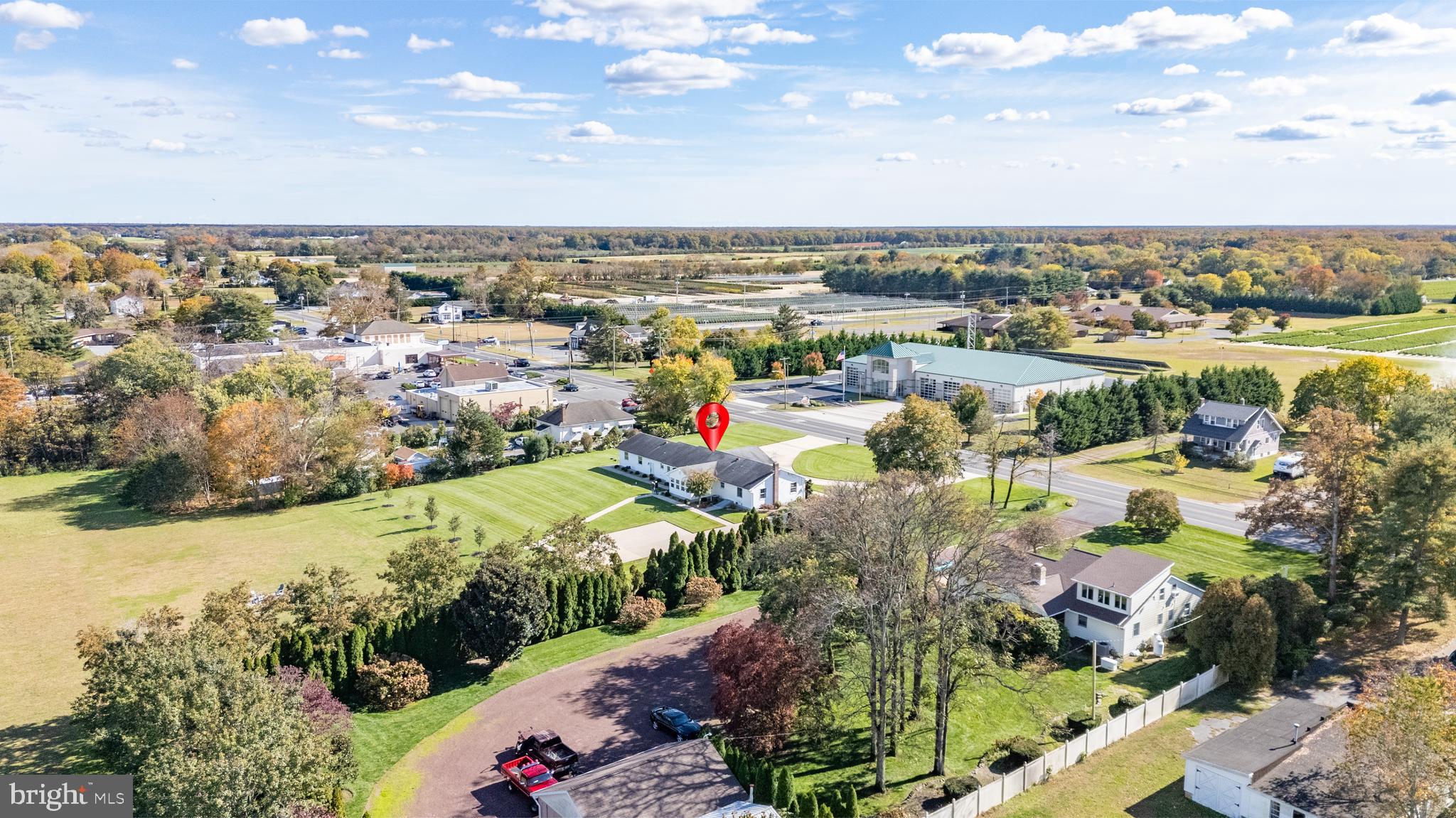 4926 Landis Avenue Vineland, NJ 08360 - Photo 63 of 73 an aerial view of a city with lots of residential buildings ocean and mountain view in back