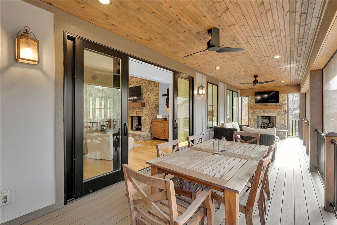 243 Quay Court Sunset, SC 29685 - Photo 12 of 46 An inviting outdoor living area seamlessly extends from the interior, offering relaxation and entertainment.