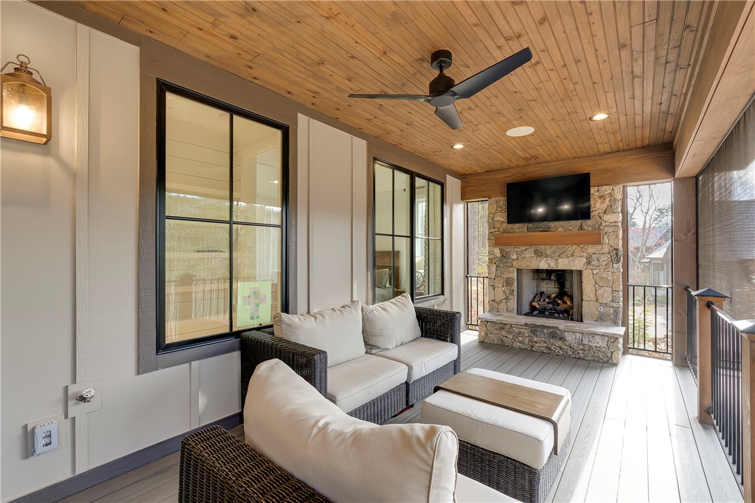 243 Quay Court Sunset, SC 29685 - Photo 13 of 46 This inviting porch offers comfort and warmth with a fireplace.