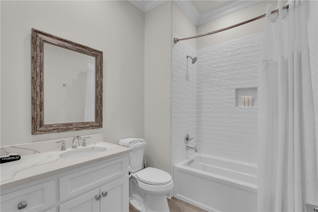 243 Quay Court Sunset, SC 29685 - Photo 28 of 46 This bright bathroom features a spacious vanity and a clean shower area.