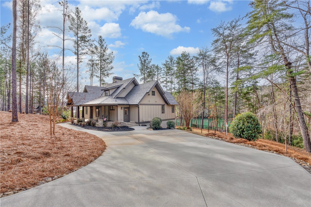 243 Quay Court Sunset, SC 29685 - Photo 3 of 46 This exquisite home offers captivating views and ample privacy.