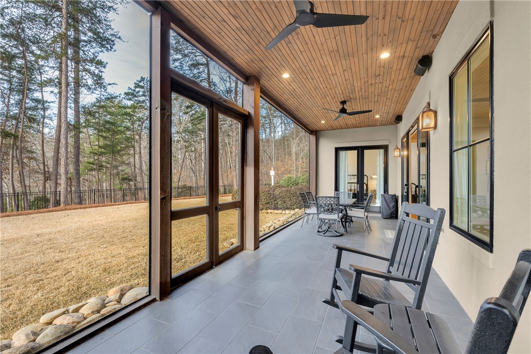 243 Quay Court Sunset, SC 29685 - Photo 31 of 46 This tranquil outdoor space seamlessly blends indoor comfort with nature's beauty.