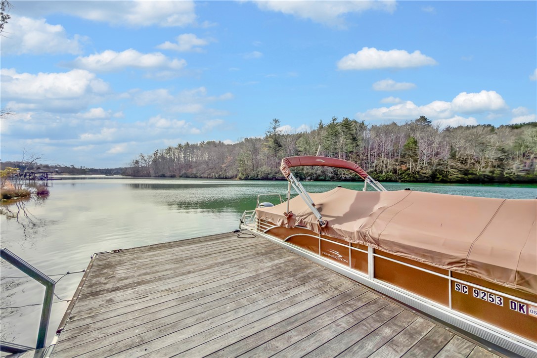 243 Quay Court Sunset, SC 29685 - Photo 37 of 46 This tranquil waterfront setting offers direct access to the lake from a private dock.