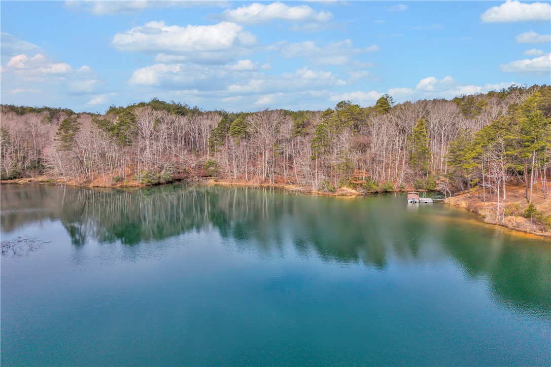 243 Quay Court Sunset, SC 29685 - Photo 39 of 46 This serene waterfront property boasts a private dock, offering direct access to tranquil waters.