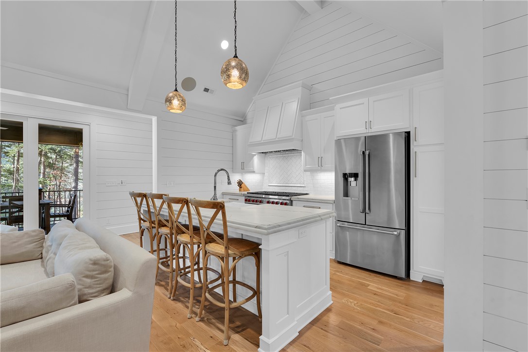 243 Quay Court Sunset, SC 29685 - Photo 8 of 46 Bright and inviting kitchen with modern appliances and a functional island for gathering.