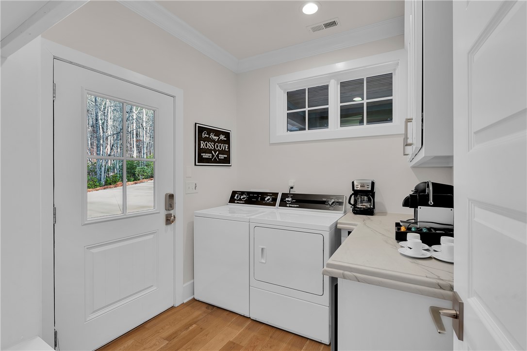 243 Quay Court Sunset, SC 29685 - Photo 9 of 46 This bright utility space offers everyday convenience with modern appliances and durable surfaces.