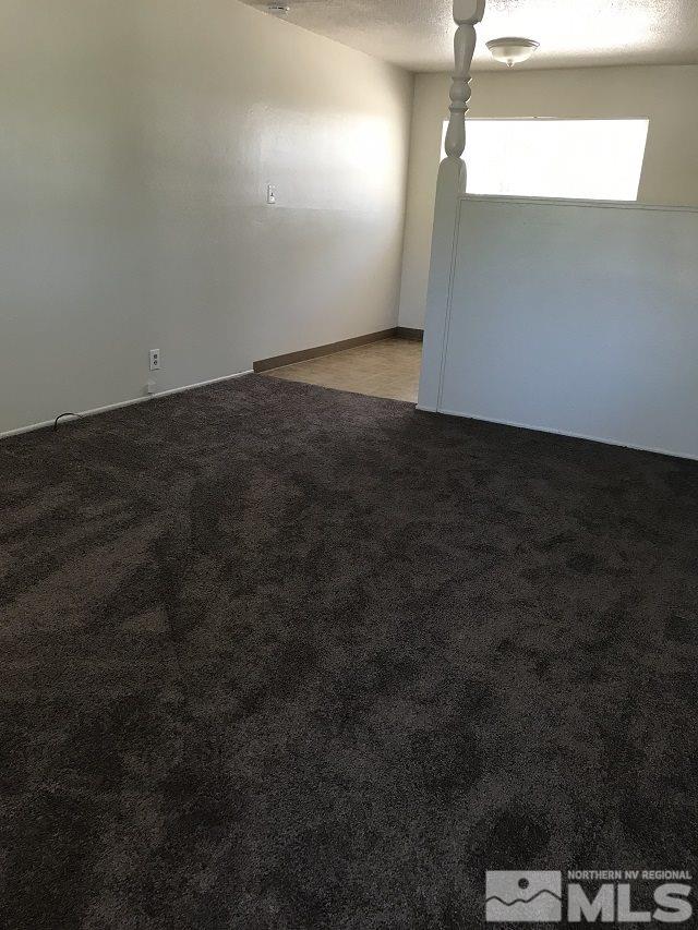 1175 Goldfield Street Reno, NV 89512 - Photo 3 of 7 a view of an empty room and window