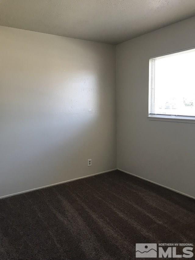 1175 Goldfield Street Reno, NV 89512 - Photo 6 of 7 an empty room with a window