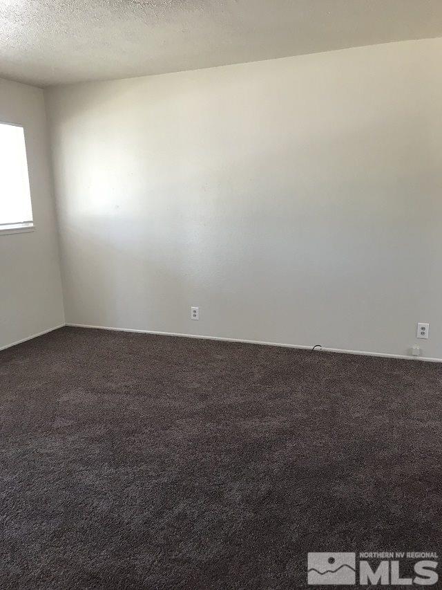 1175 Goldfield Street Reno, NV 89512 - Photo 7 of 7 an empty room with a window