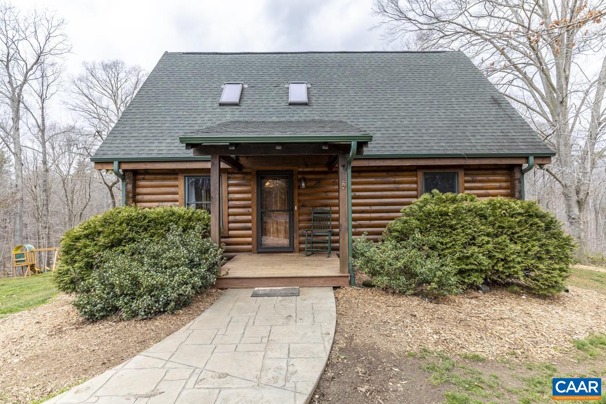 136 Buffalo Run Road Stanardsville, VA 22973 - Photo 63 of 64 a front view of a house with garden