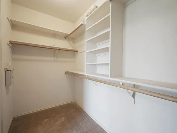 a view of a room with rack on the wall