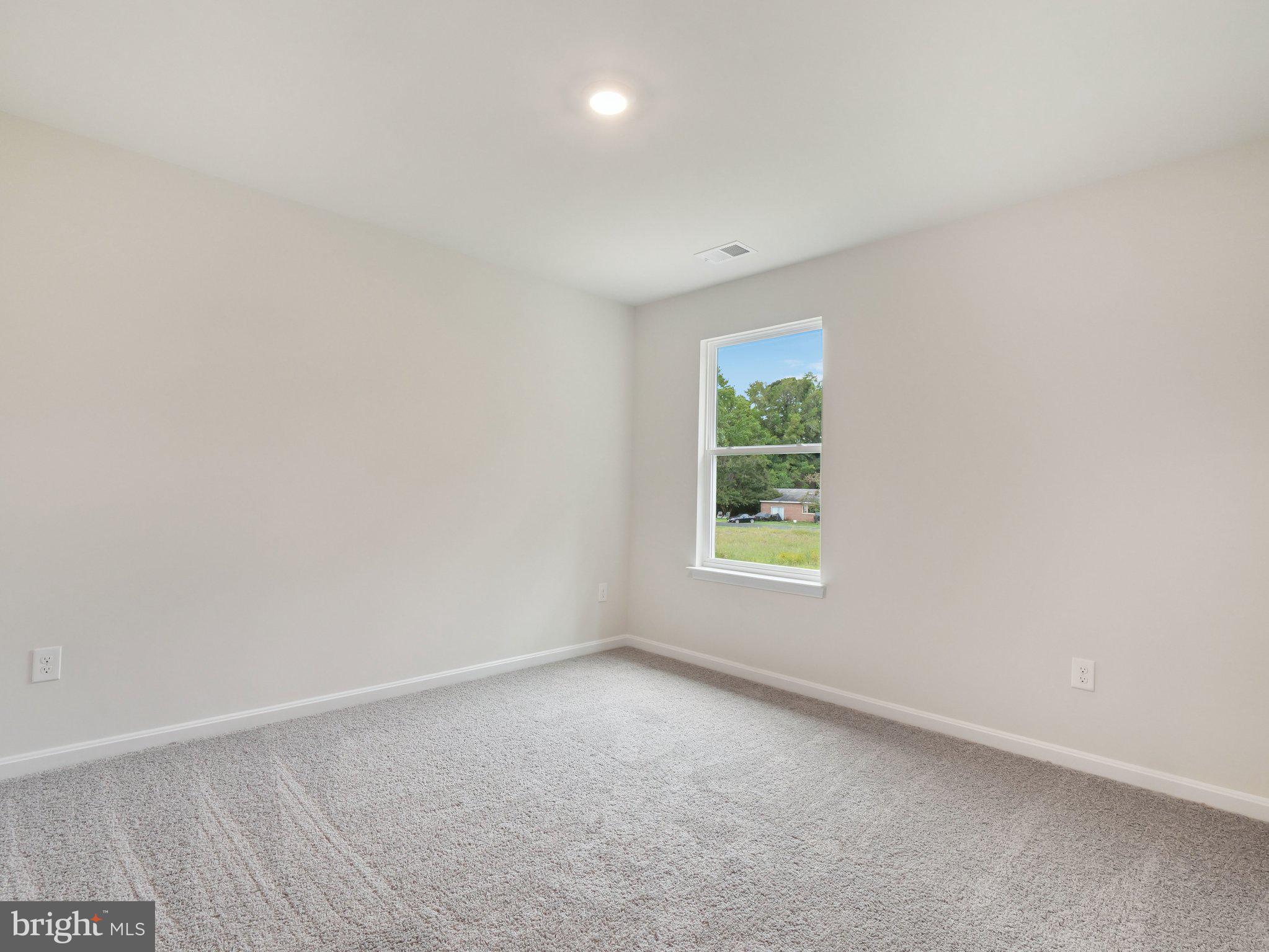 6302 Sterling Way Ruther Glen, VA 22546 - Photo 16 of 31 an empty room with windows