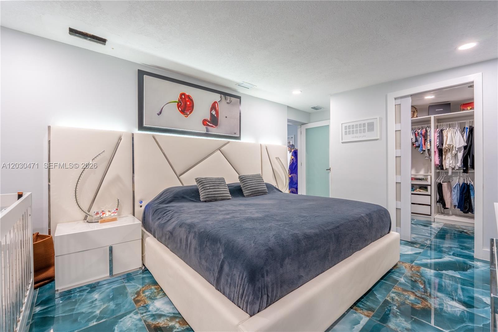 11851 Southwest 181st Street Miami, FL 33177 - Photo 11 of 25 a bed room with a bed and a view of living room