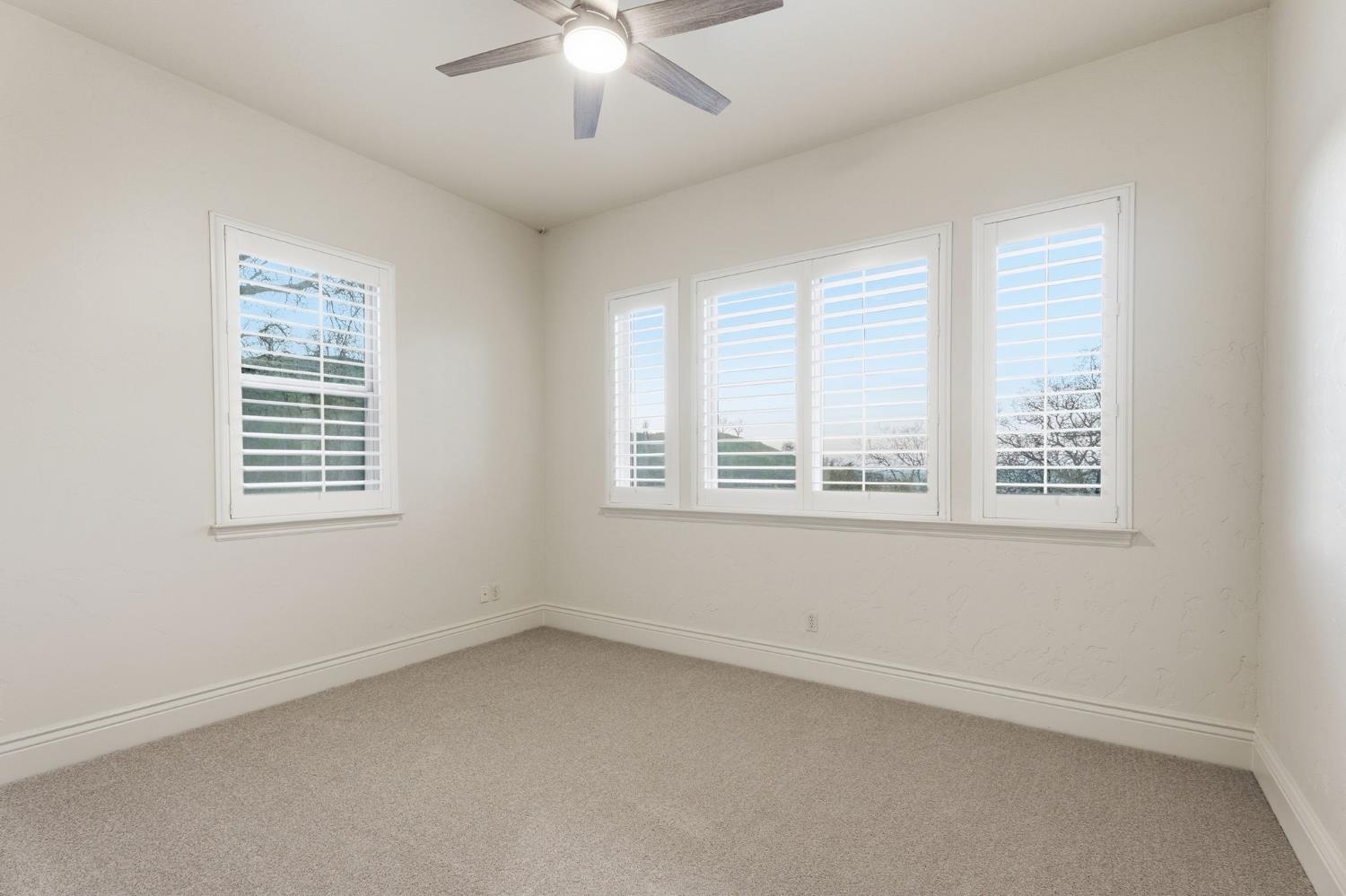 22221 Masters Drive Friant, CA 93626 - Photo 18 of 87 a view of an empty room with a window