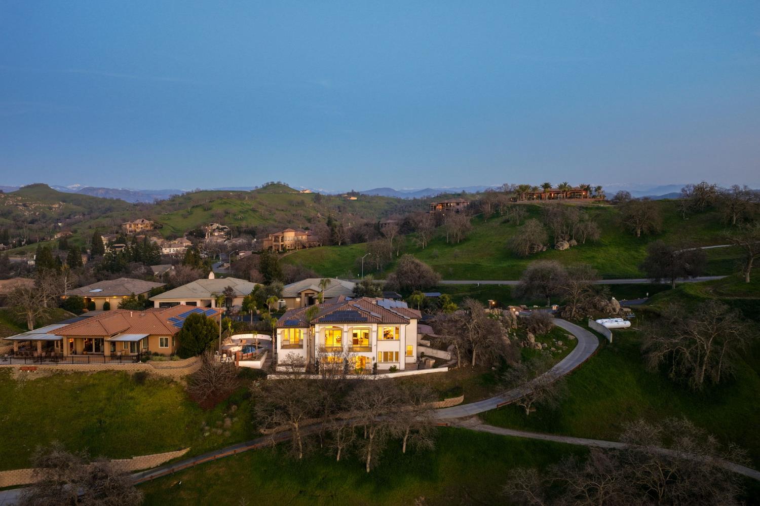 22221 Masters Drive Friant, CA 93626 - Photo 24 of 87 an aerial view of a house with a garden and mountains