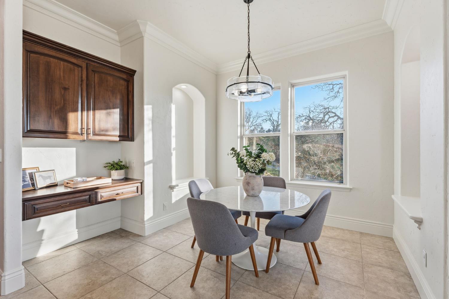 22221 Masters Drive Friant, CA 93626 - Photo 35 of 87 a view of a dining room with furniture window and wooden floor