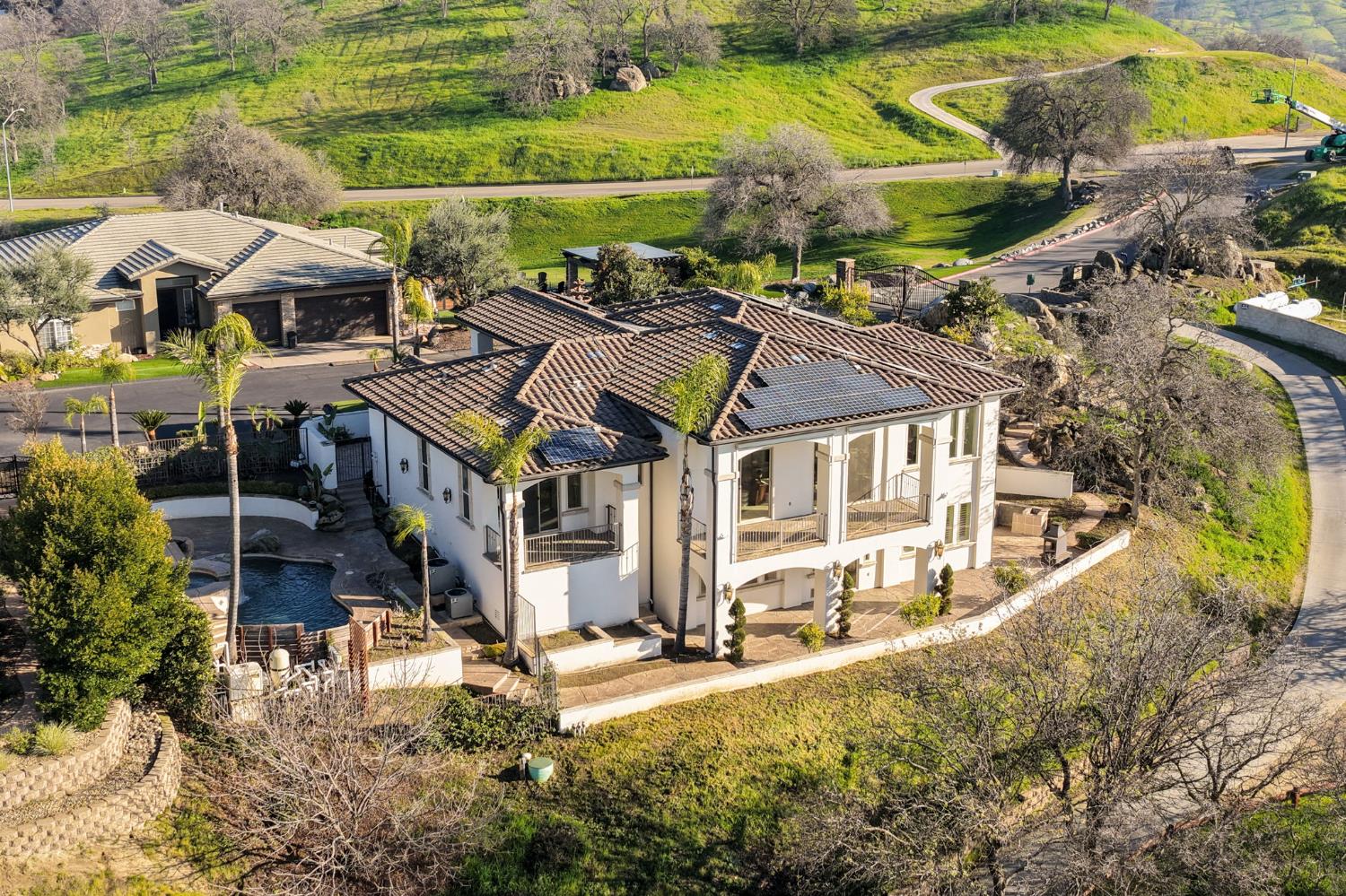 22221 Masters Drive Friant, CA 93626 - Photo 53 of 87 a view of a house with a yard and sitting area
