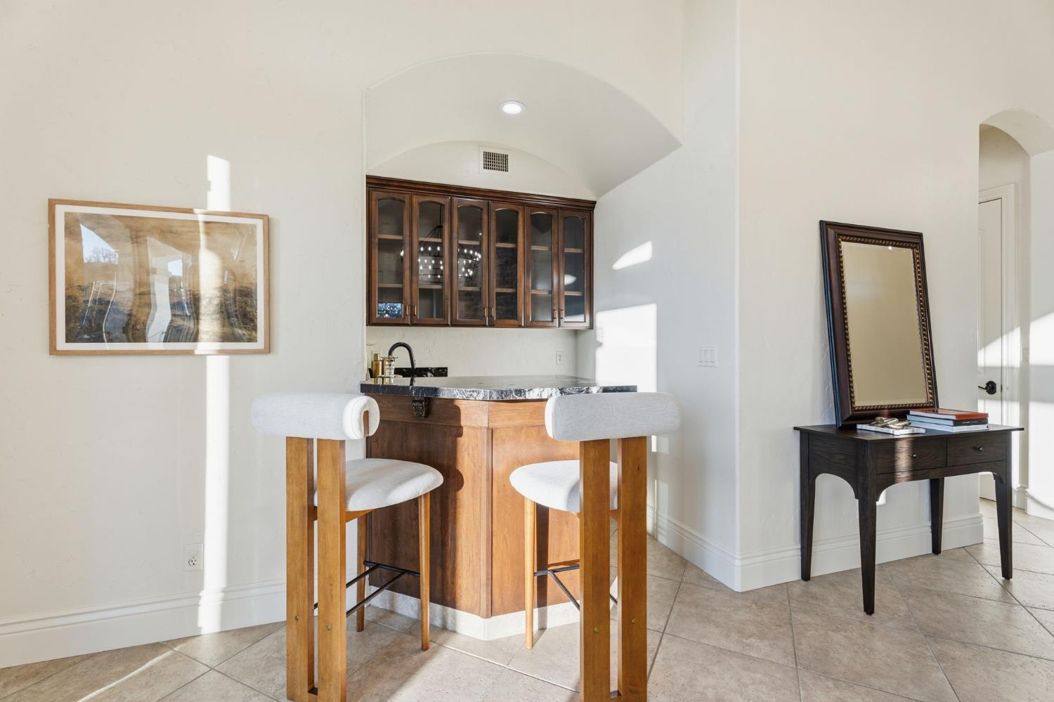 22221 Masters Drive Friant, CA 93626 - Photo 61 of 87 a view of a dining room with furniture and chandelier