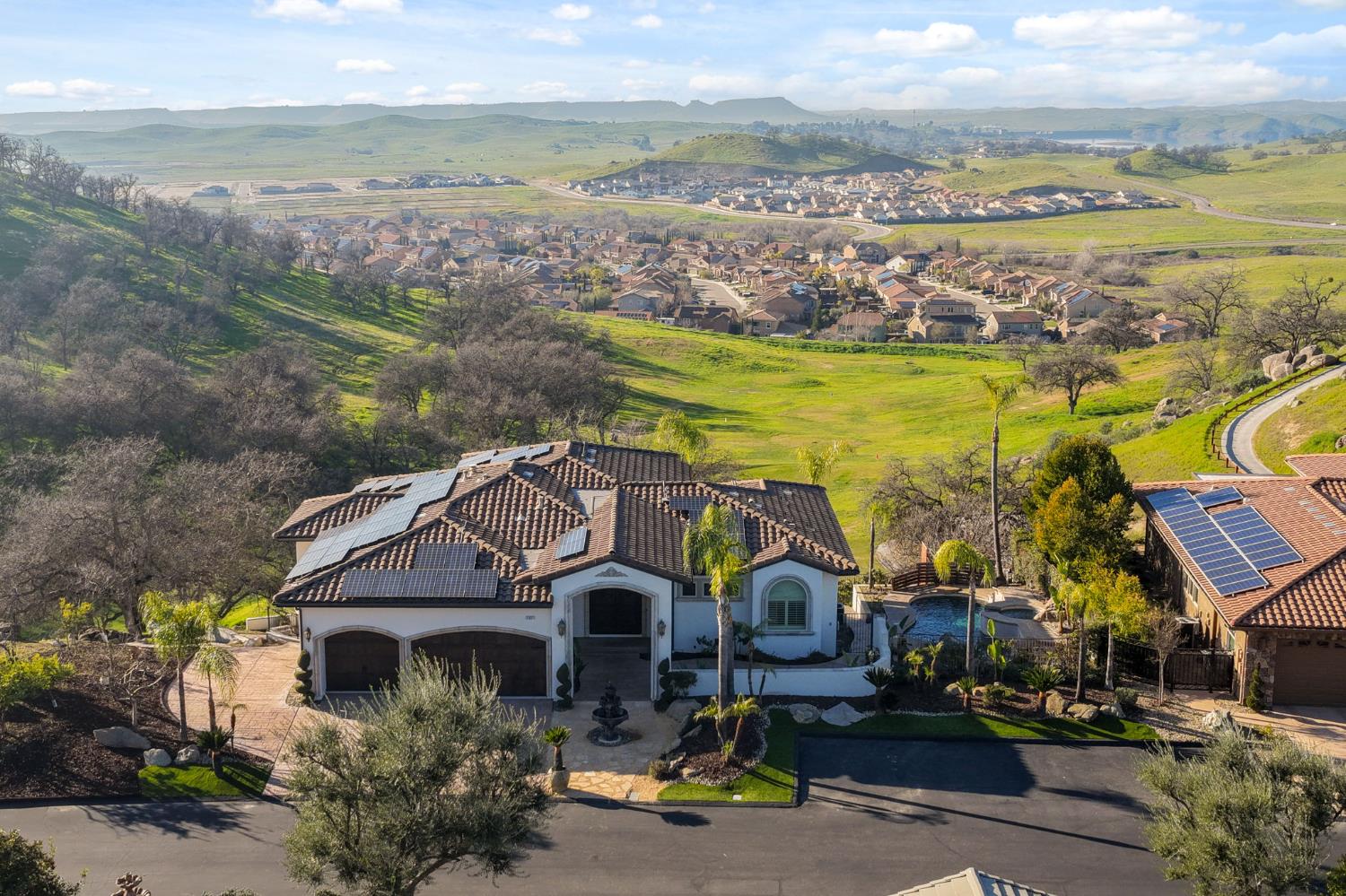 22221 Masters Drive Friant, CA 93626 - Photo 80 of 87 a front view of a house with a ocean view