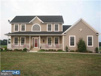 643 Haines Neck Road Salem, NJ 08079 - Photo 1 of 1 a front view of a house with a garden
