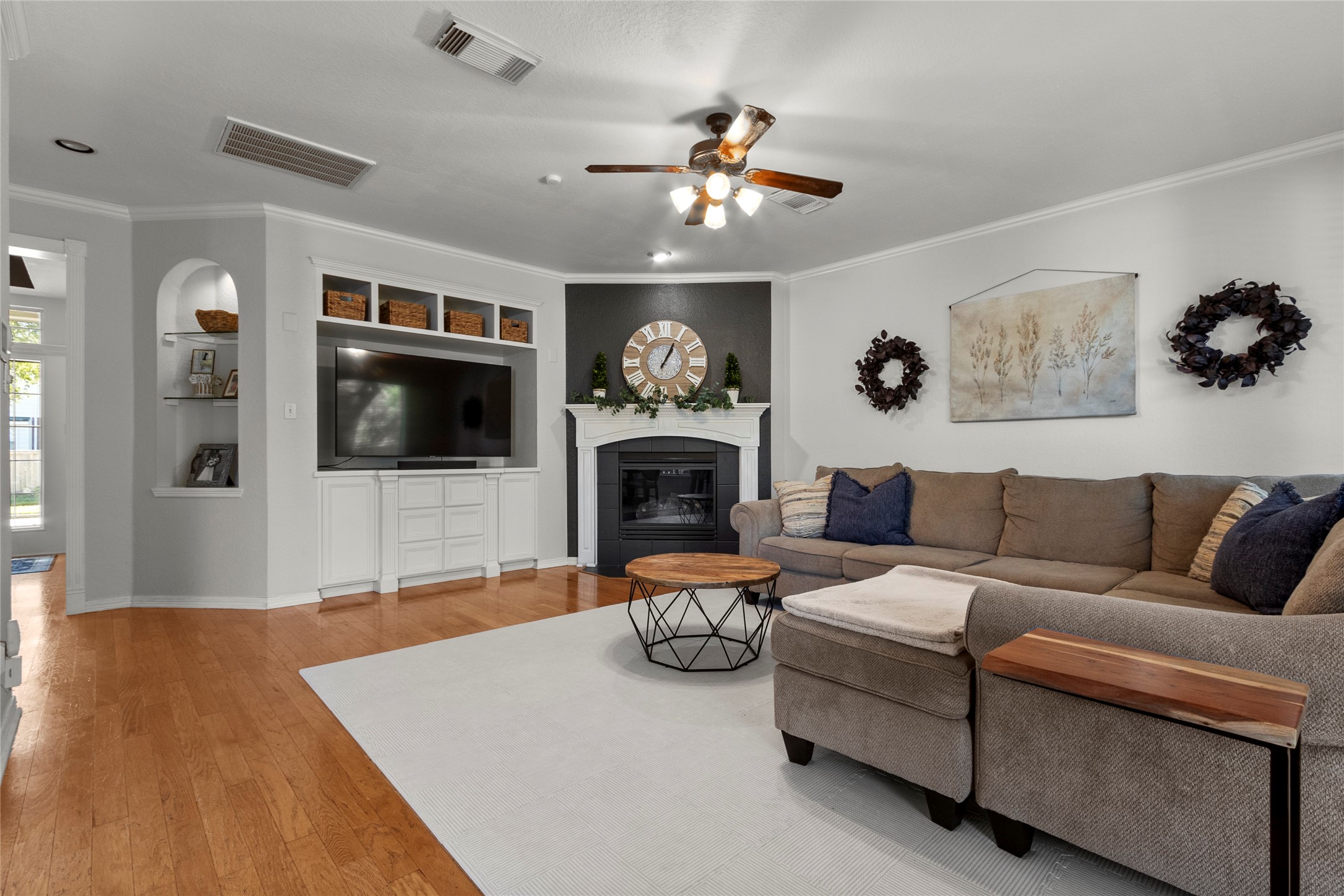 9114 Kirkstone Drive Spring, TX 77379 - Photo 14 of 31 a living room with furniture and a flat screen tv