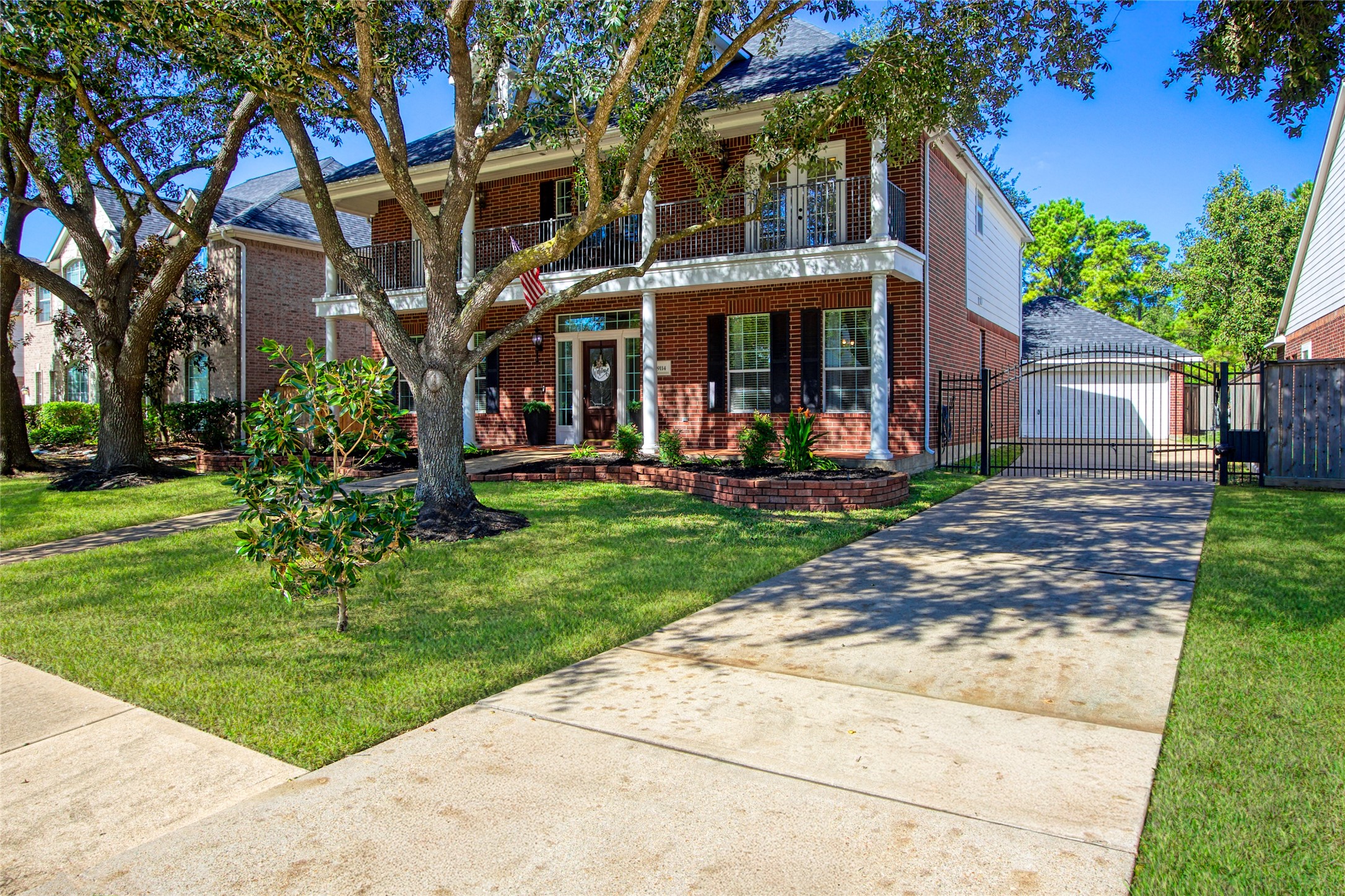 9114 Kirkstone Drive Spring, TX 77379 - Photo 2 of 31 front view of a house with a yard