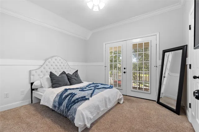 a bed room with a bed and a window