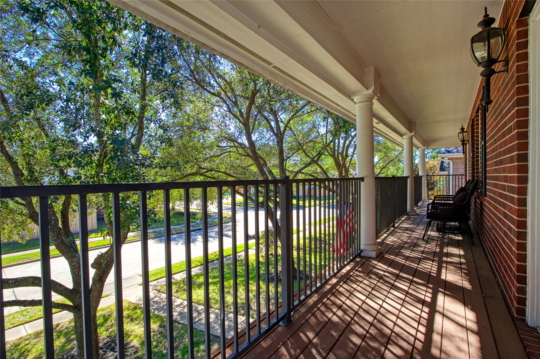 9114 Kirkstone Drive Spring, TX 77379 - Photo 26 of 31 a view of a balcony with wooden floor
