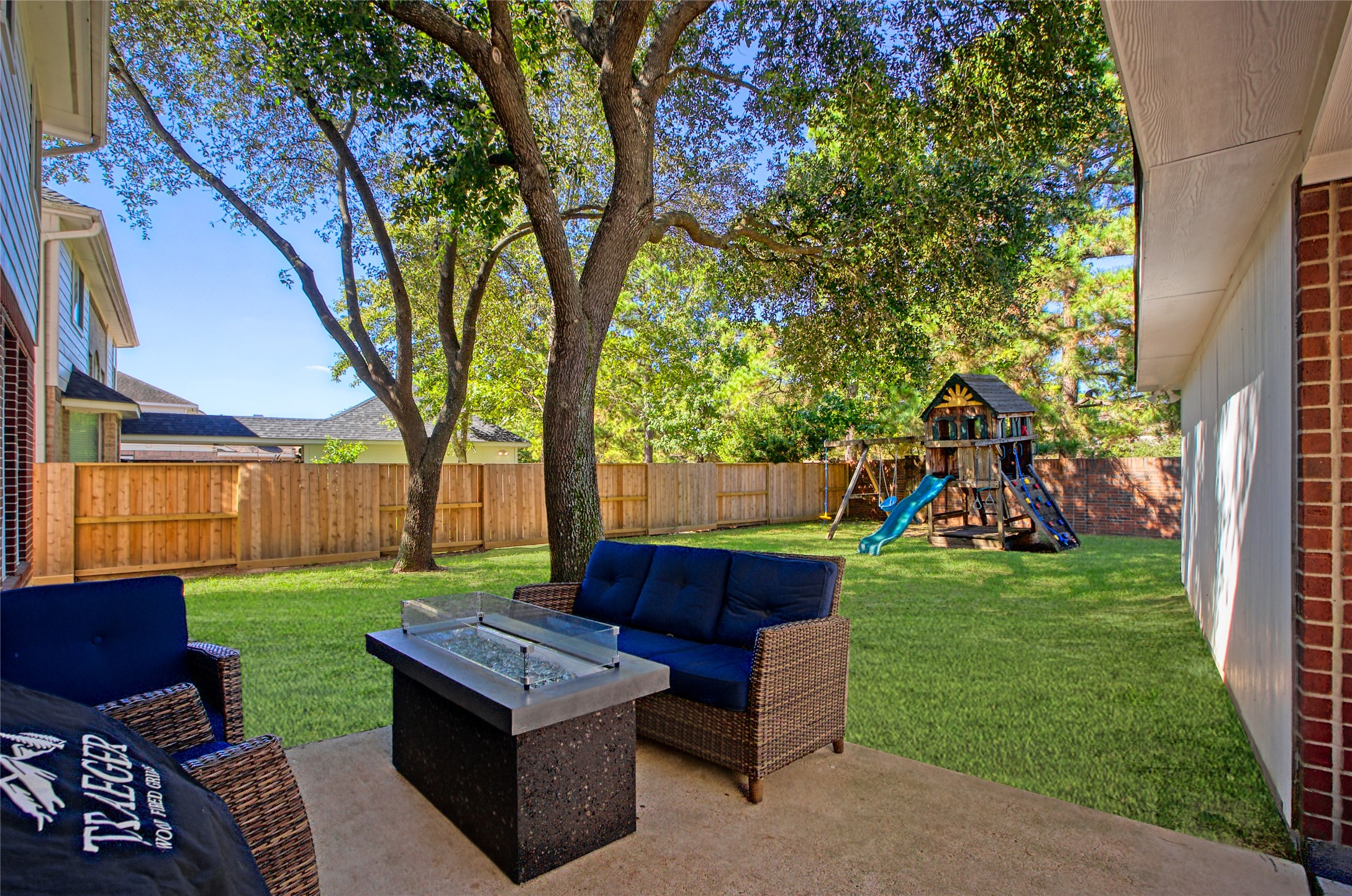 9114 Kirkstone Drive Spring, TX 77379 - Photo 27 of 31 a view of a backyard with sitting area