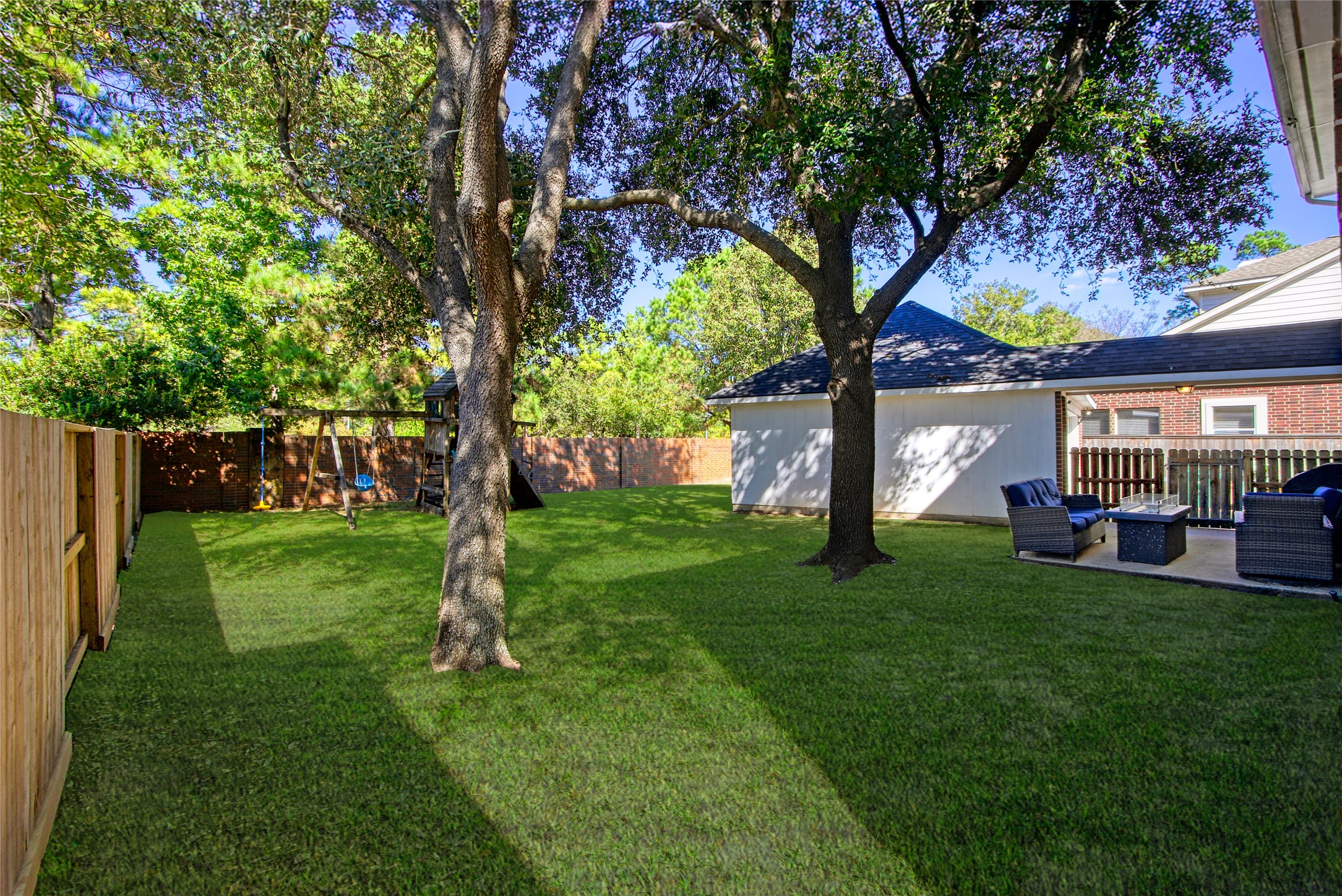 9114 Kirkstone Drive Spring, TX 77379 - Photo 28 of 31 a view of a house with a yard