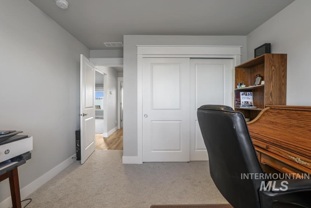 4073 Williams Street Buhl, ID 83316 - Photo 25 of 31 Office area featuring light carpet and baseboards