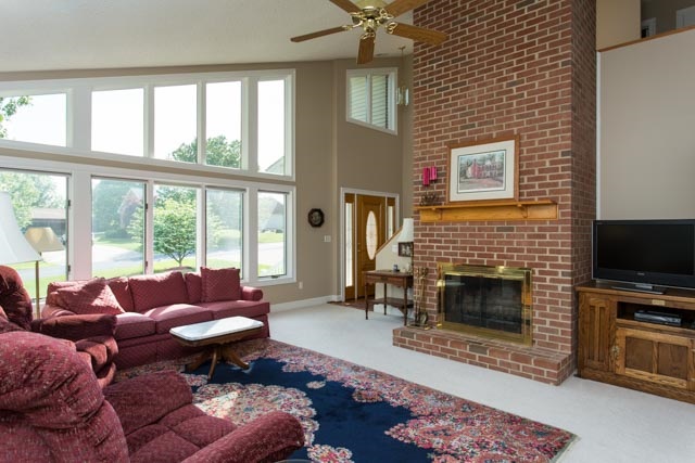 3213 Arrowhead Road Harrisonburg, VA 22801 - Photo 11 of 41 Cozy up to the fireplace with floor-to-ceiling brick hearth during the cold winter months.