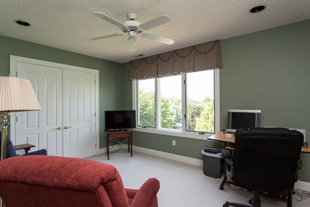 3213 Arrowhead Road Harrisonburg, VA 22801 - Photo 20 of 41 This bedroom with large window is currently being used as a home office, and is situated on the second level.