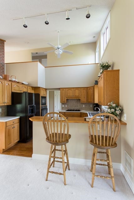 3213 Arrowhead Road Harrisonburg, VA 22801 - Photo 6 of 41 Bar seating for two provides casual, convenient dining space in the kitchen.