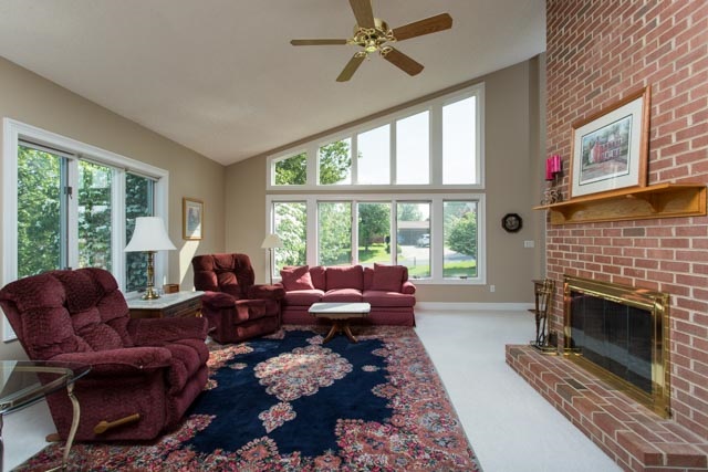 3213 Arrowhead Road Harrisonburg, VA 22801 - Photo 10 of 41 The gorgeous brick fireplace is the focal point of the great room, and floor-to-ceiling windows let in fantastic natural light.