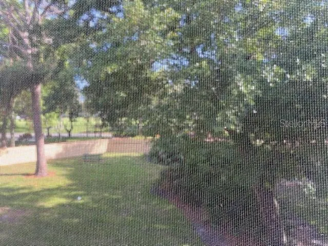 a view of a room that has a window